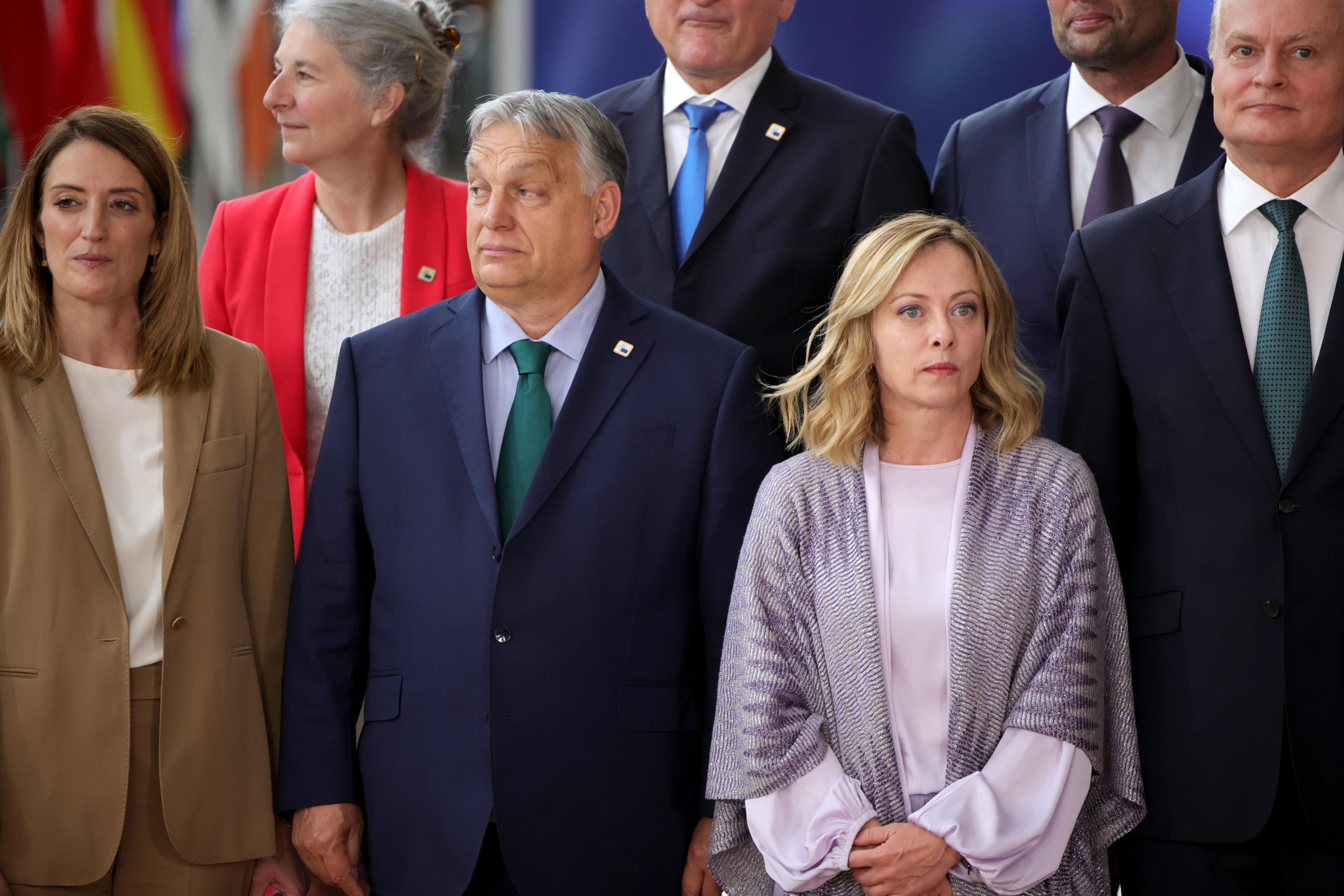 epa11441311 EU leaders, among them Italy's Prime Minister Giorgia Meloni (C-R) and Hungary's Prime Minister Viktor Orban (C-L), pose for a family photo with Ukraine's President Volodymyr Zelensky as they arrive for a European Council in Brussels, Belgium, 27 June 2024. EU leaders are gathering in Brussels for a two-day summit to discuss the Strategic Agenda 2024-2029, the next institutional cycle, Ukraine, the Middle East, competitiveness, security and defense, among other topics.  EPA/OLIVIER MATTHYS