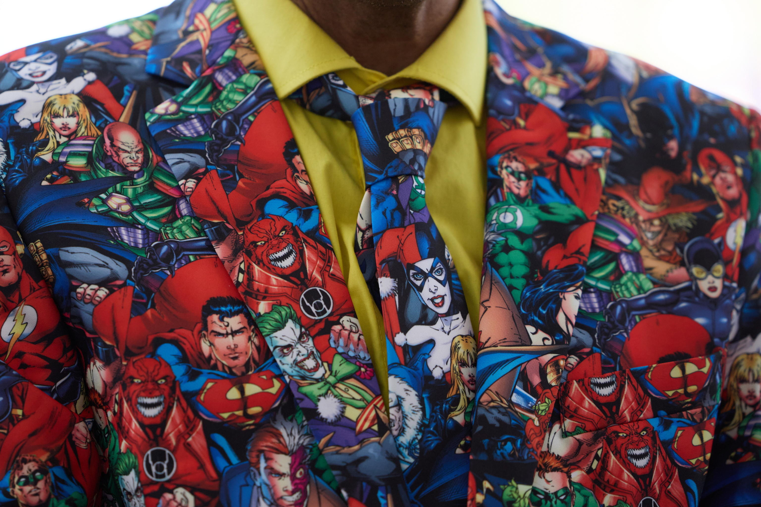 epa11496757 A man wears a suit with DC Comics characters at Comic-Con International in San Diego, California, USA, 25 July 2024. San Diego Comic-Con International is a comics arts conference held from 25-28 July 2024.  EPA/ALLISON DINNER