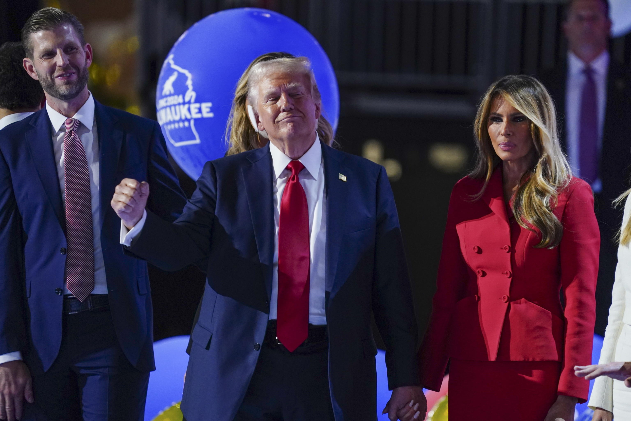 epa11486794 Republican presidential nominee and former President Donald J. Trump is joined on stage by his wife Melania Trump following his remarks during the final day of the Republican National Convention (RNC) at the Fiserv Forum in Milwaukee, Wisconsin, USA, 18 July 2024. The convention comes just a few days after a 20-year-old Pennsylvania man attempted to assassinate former President and current Republican presidential nominee Donald Trump. The RNC is being held 15 to 18 July 2024 and is where delegates from the Republican Party select their nominees for president and vice president in the 2024 US presidential election.  EPA/SHAWN THEW