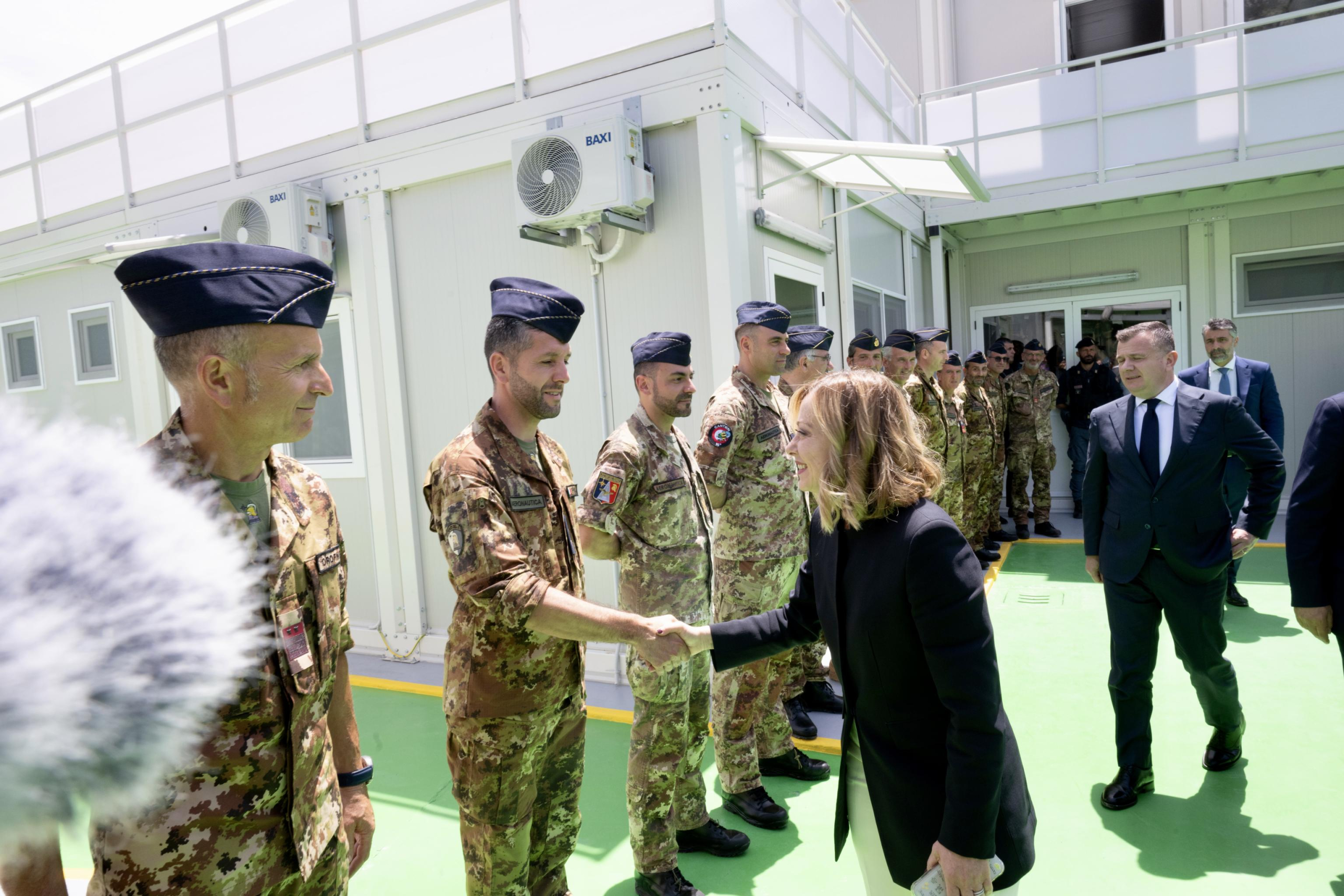 La premier Giorgia Meloni e il primo ministro albanese Edi Rama al porto di Shengjin per una visita all'hospot destinato alle procedure di ingresso dei migranti, realizzato in base al Protocollo fra Italia e Albania, 05 giugno 2024./// Italian Prime Minister Giorgia Meloni and Albanian Prime Minister Edi Rama at the port of Shengjin for a visit to the hotspot intended for the entry procedures of migrants, created on the basis of the Protocol between Italy and Albania, 05 June 2024.
ANSA/ UFFICIO STAMPA PRESIDENZA DEL CONSIGLIO/ FILIPPO ATTILI
+++ ANSA PROVIDES ACCESS TO THIS HANDOUT PHOTO TO BE USED SOLELY TO ILLUSTRATE   NEWS REPORTING OR COMMENTARY ON THE FACTS OR EVENTS DEPICTED IN THIS IMAGE; NO   ARCHIVING; NO LICENSING +++ NPK +++