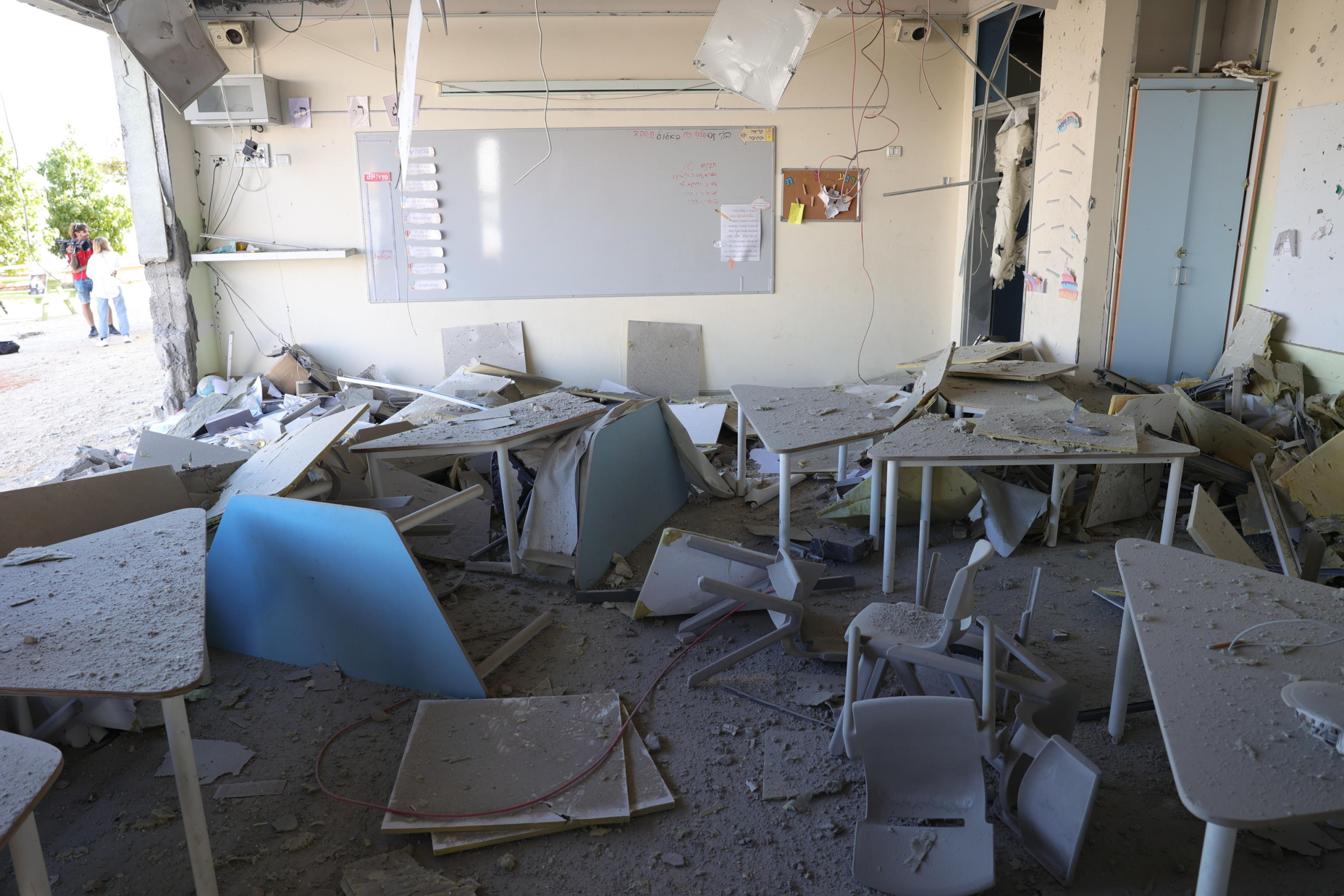 epa11637148 A school damaged by ballistic missiles fired from Iran, in Gedera, Israel, 02 October 2024. According to the Israeli military, Iran launched over 180 ballistic missiles towards Israel in the evening of 01 October, with alert sirens sounding across the country.  EPA/ABIR SULTAN