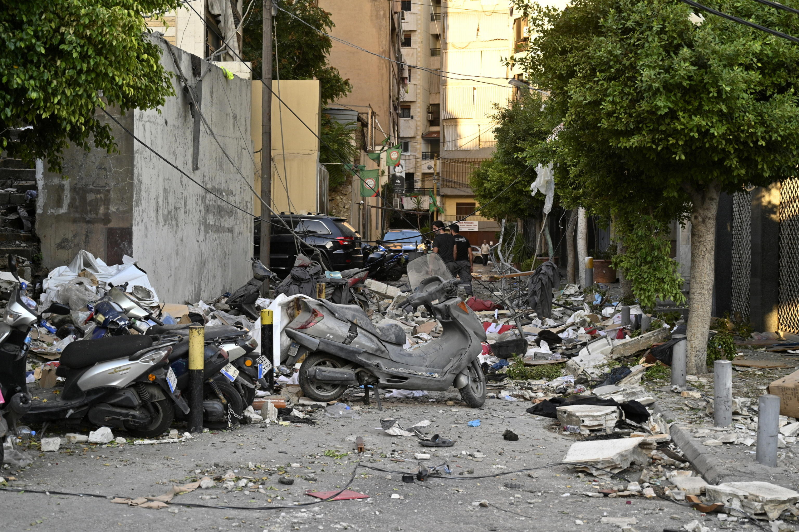 epa11639142 Debris lies on a road following an Israeli airstrike in Beirut's Bachoura neighborhood, Lebanon, 03 October 2024. Lebanese officials reported that an Israeli airstrike on a building in central Beirut resulted in at least five deaths and eight injuries.  EPA/WAEL HAMZEH