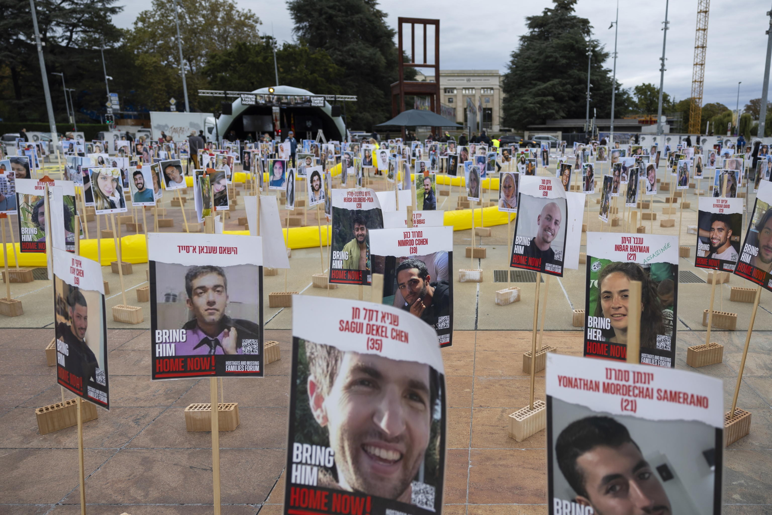 epa11646158 Photos of victims of the attacks of October 7, 2023 during a demonstration in support of Israel to mark the first anniversary of the Hamas attack on Israel in front of the United Nations offices in Geneva, Switzerland, 06 October 2024.  Upcoming 07 October 2024 marks one year since the Palestinian militant group Hamas launched a surprise attack on Israel, killing 1,200, and one year since Israel began its war on Gaza, killing more than 41,000 and destroying the Palestinian enclave.  EPA/CYRIL ZINGARO