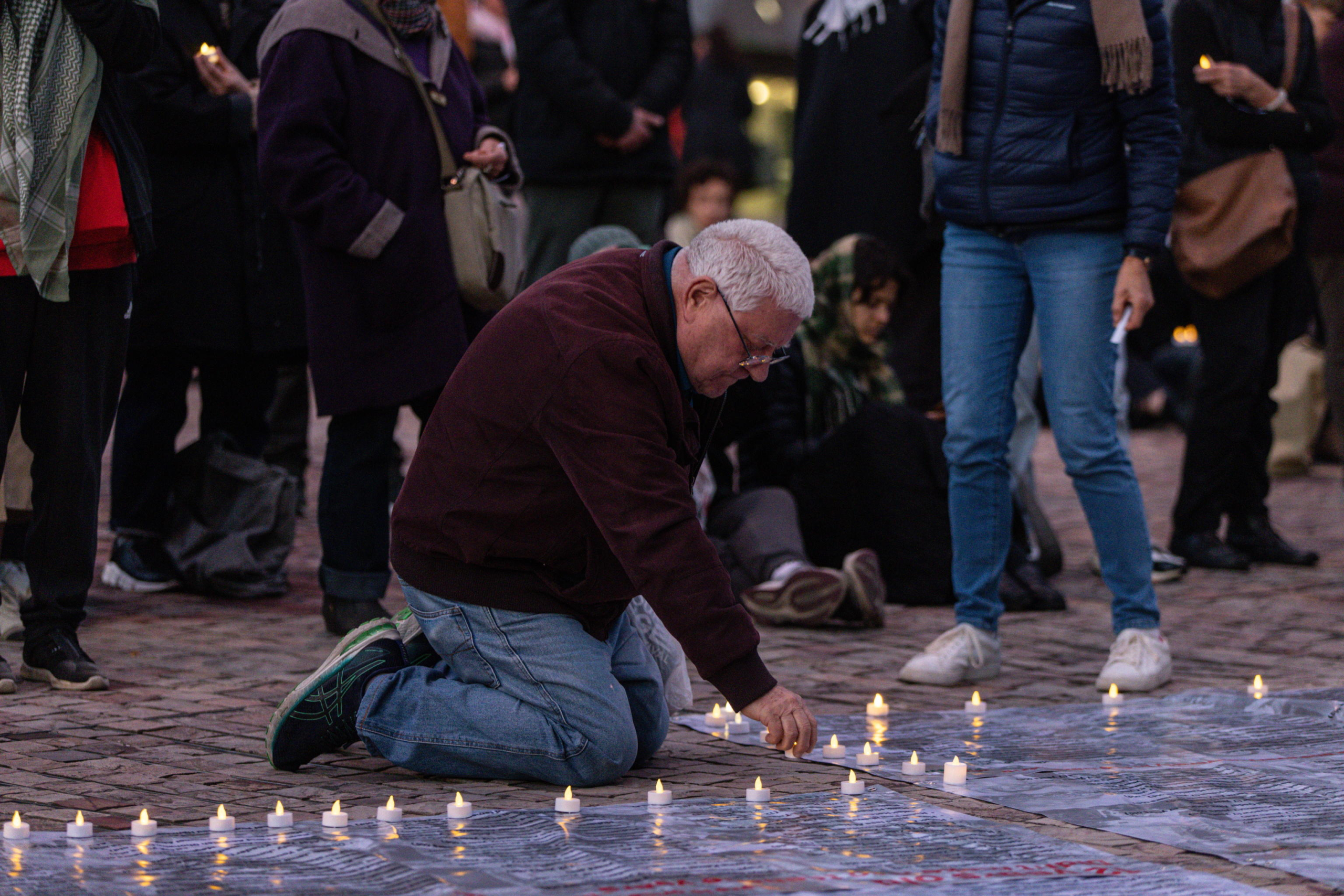 epa11654331 Community members gather for a Free Palestine Melbourne vigil to remember victims of the Gaza attacks at Federation Square in Melbourne, Australia, 11 October 2024. A Free Palestine Melbourne vigil is taking place at Federation Square, where community members are gathering to remember victims of Israeli attacks in Gaza.  EPA/DIEGO FEDELE AUSTRALIA AND NEW ZEALAND OUT