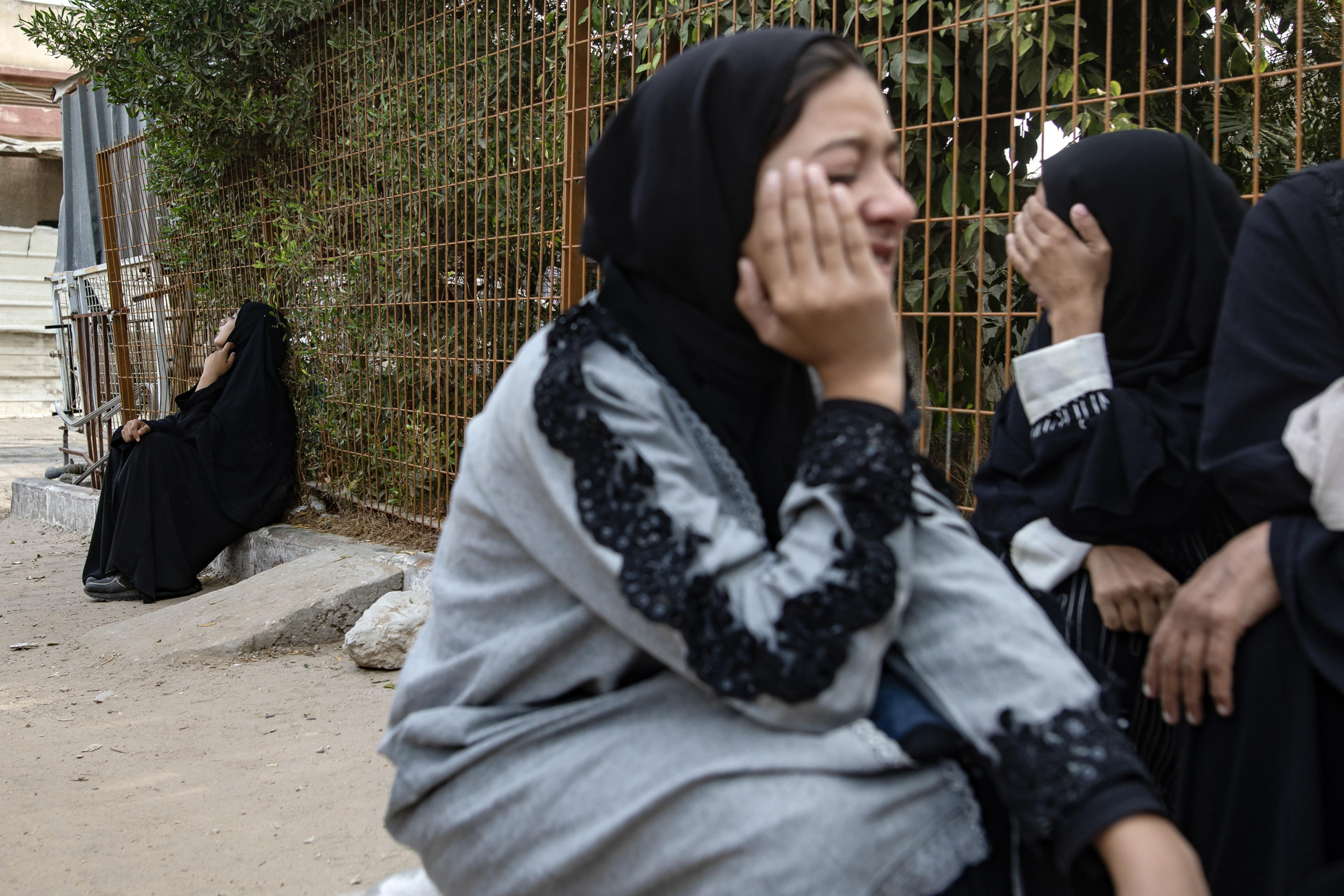 epa11659964 Palestinian women, victims' relatives, mourn the members of the Abu Taima family, killed in an Israeli air strike, at the Khan Younis refugee camp, southern Gaza Strip, 15 October 2024. According to Nasser Hospital, at least 10 members of an extended family were killed in an Israeli airstrike on their home in Bani Suhaila, east of Khan Younis early on 15 October. More than 42,200 Palestinians and over 1,400 Israelis have been killed, according to the Palestinian Health Ministry and the Israeli Army, Tsahal, since Hamas militants launched an attack against Israel from the Gaza Strip on 07 October 2023, and the Israeli operations in Gaza and the West Bank which followed it.  EPA/HAITHAM IMAD