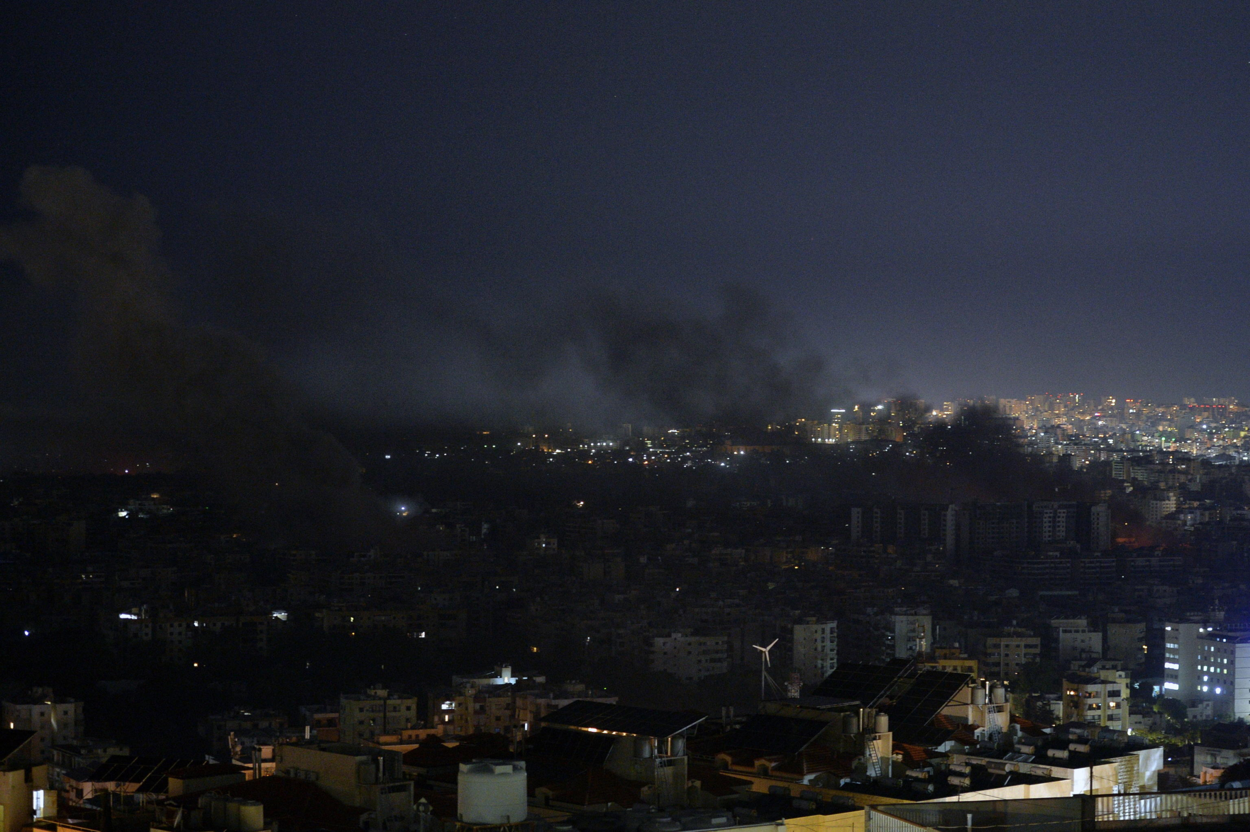 epa11681815 Smoke rises from buildings as a result of Israeli airstrikes at Dahieh in the southern suburb of Beirut, Lebanon, late 24 October 2024. Israeli airstrikes hit Dahieh in the southern suburb of Beirut after the Israeli Army issued warnings to evacuate the buildings. According to the Lebanese Ministry of Health, more than 2,500 people have been killed and over 12,000 others have been injured in Lebanon since the start of recent escalations of hostilities.  EPA/WAEL HAMZEH