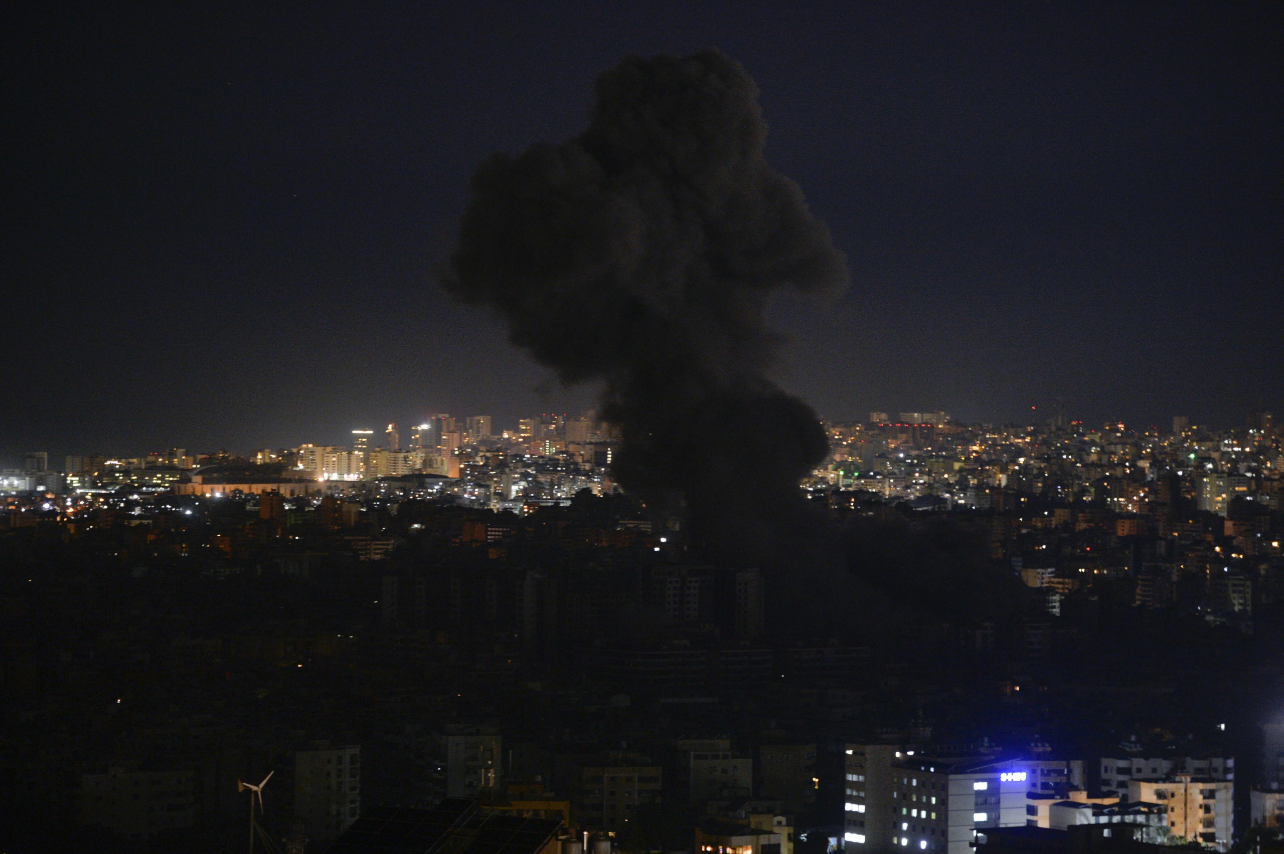 epa11681813 Smoke rises from buildings as a result of Israeli airstrikes at Dahieh in the southern suburb of Beirut, Lebanon, late 24 October 2024. Israeli airstrikes hit Dahieh in the southern suburb of Beirut after the Israeli Army issued warnings to evacuate the buildings. According to the Lebanese Ministry of Health, more than 2,500 people have been killed and over 12,000 others have been injured in Lebanon since the start of recent escalations of hostilities.  EPA/WAEL HAMZEH