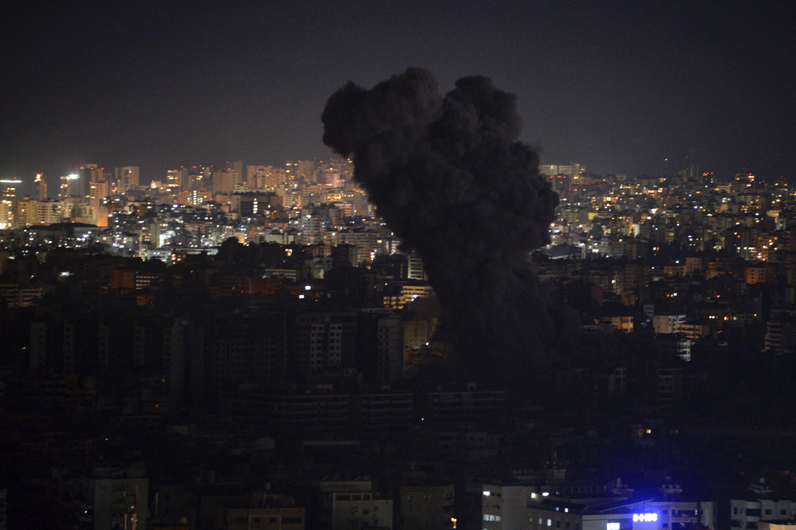 epa11681812 Smoke rises from buildings as a result of Israeli airstrikes at Dahieh in the southern suburb of Beirut, Lebanon, late 24 October 2024. Israeli airstrikes hit Dahieh in the southern suburb of Beirut after the Israeli Army issued warnings to evacuate the buildings. According to the Lebanese Ministry of Health, more than 2,500 people have been killed and over 12,000 others have been injured in Lebanon since the start of recent escalations of hostilities.  EPA/WAEL HAMZEH