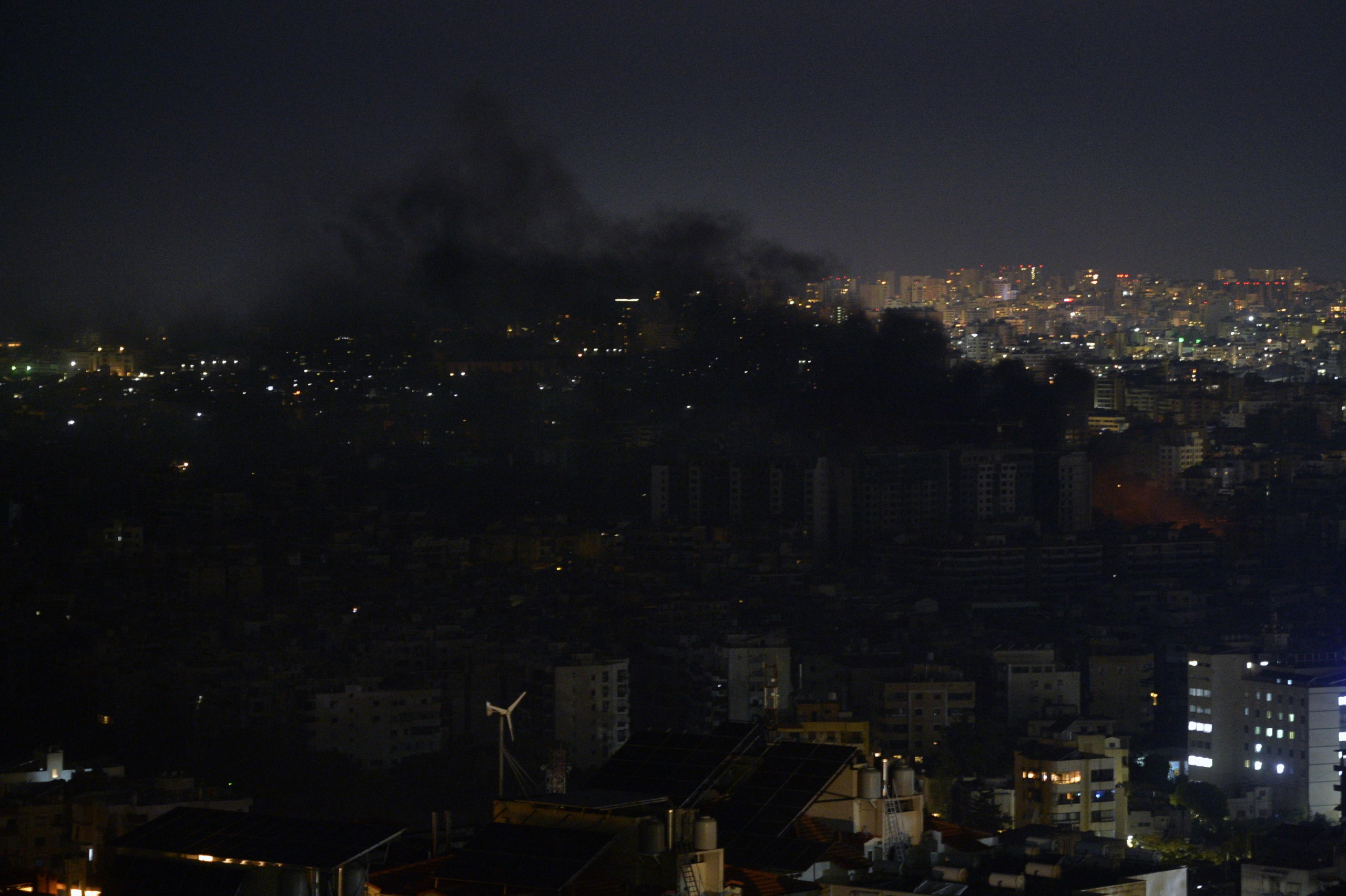 epa11681816 Smoke rises from buildings as a result of Israeli airstrikes at Dahieh in the southern suburb of Beirut, Lebanon, late 24 October 2024. Israeli airstrikes hit Dahieh in the southern suburb of Beirut after the Israeli Army issued warnings to evacuate the buildings. According to the Lebanese Ministry of Health, more than 2,500 people have been killed and over 12,000 others have been injured in Lebanon since the start of recent escalations of hostilities.  EPA/WAEL HAMZEH