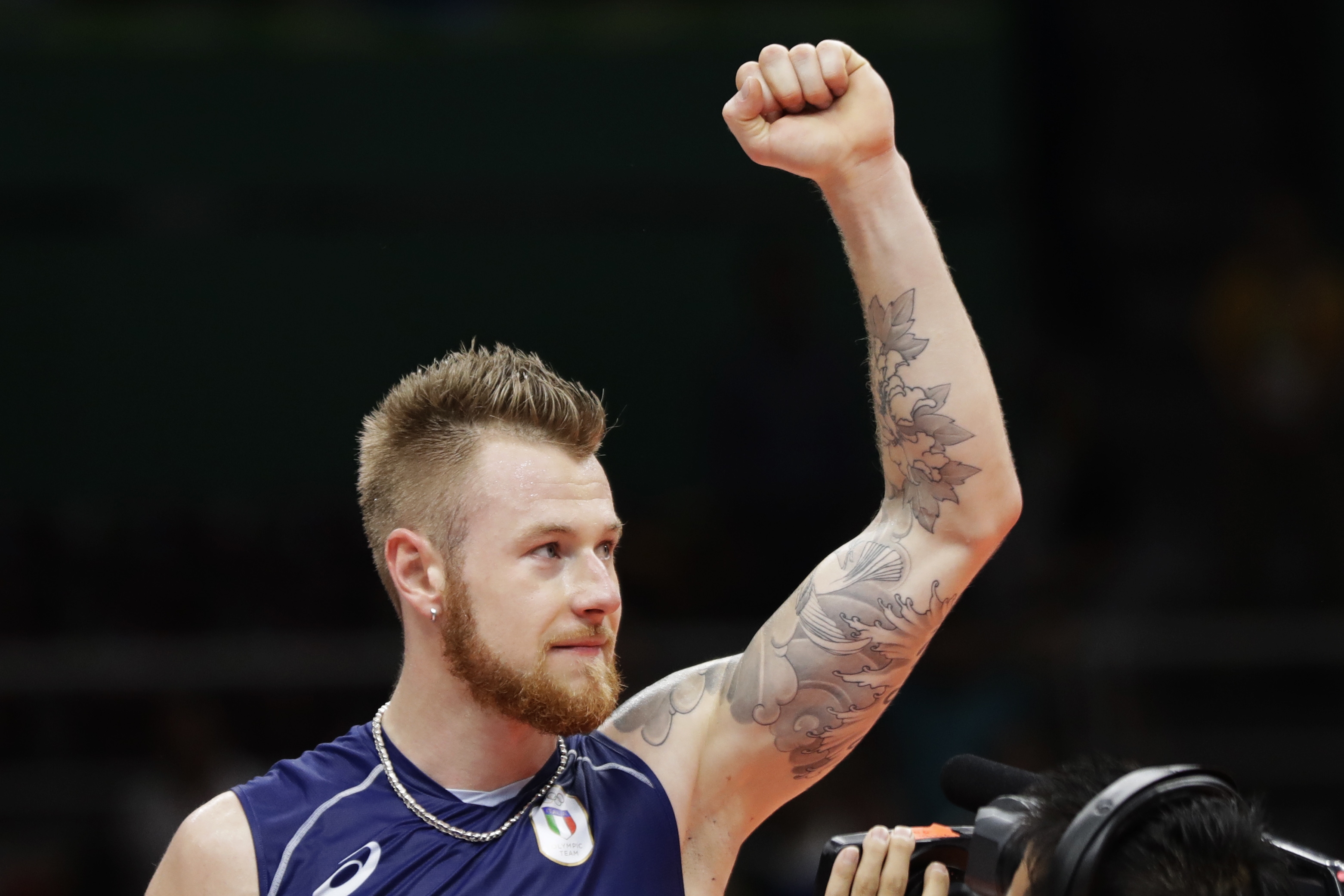 Italy's Ivan Zaytsev celebrates after a men's quarterfinal volleyball match against Iran at the 2016 Summer Olympics in Rio de Janeiro, Brazil, Wednesday, Aug. 17, 2016. (AP Photo/Matt Rourke)