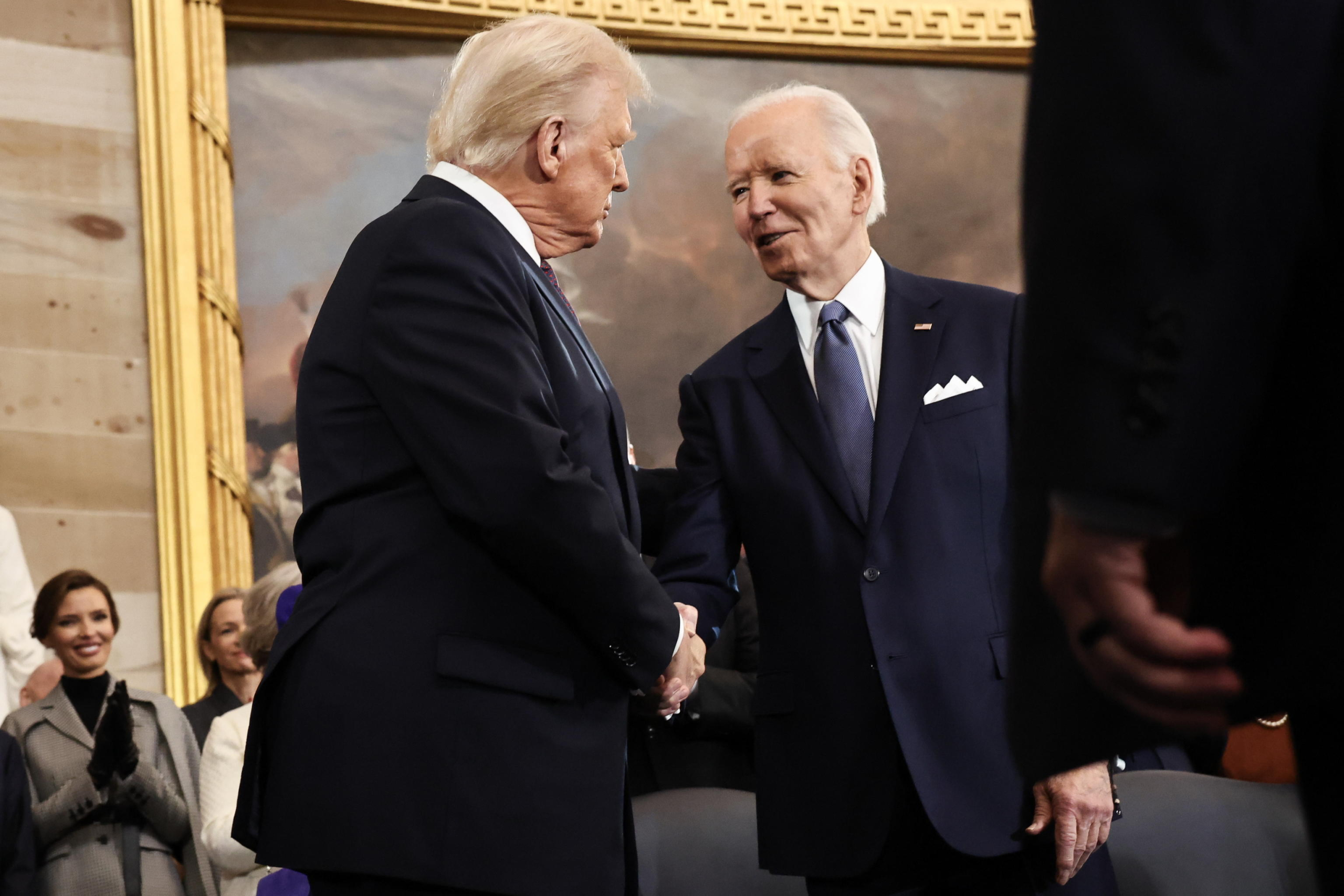 epa11839118 U.S. President-elect Donald Trump greets U.S. President Joe Biden as he arrives for inauguration ceremonies in the Rotunda of the U.S. Capitol on January 20, 2025 in Washington, DC. Donald Trump takes office for his second term as the 47th president of the United States.  EPA/Chip Somodevilla / POOL