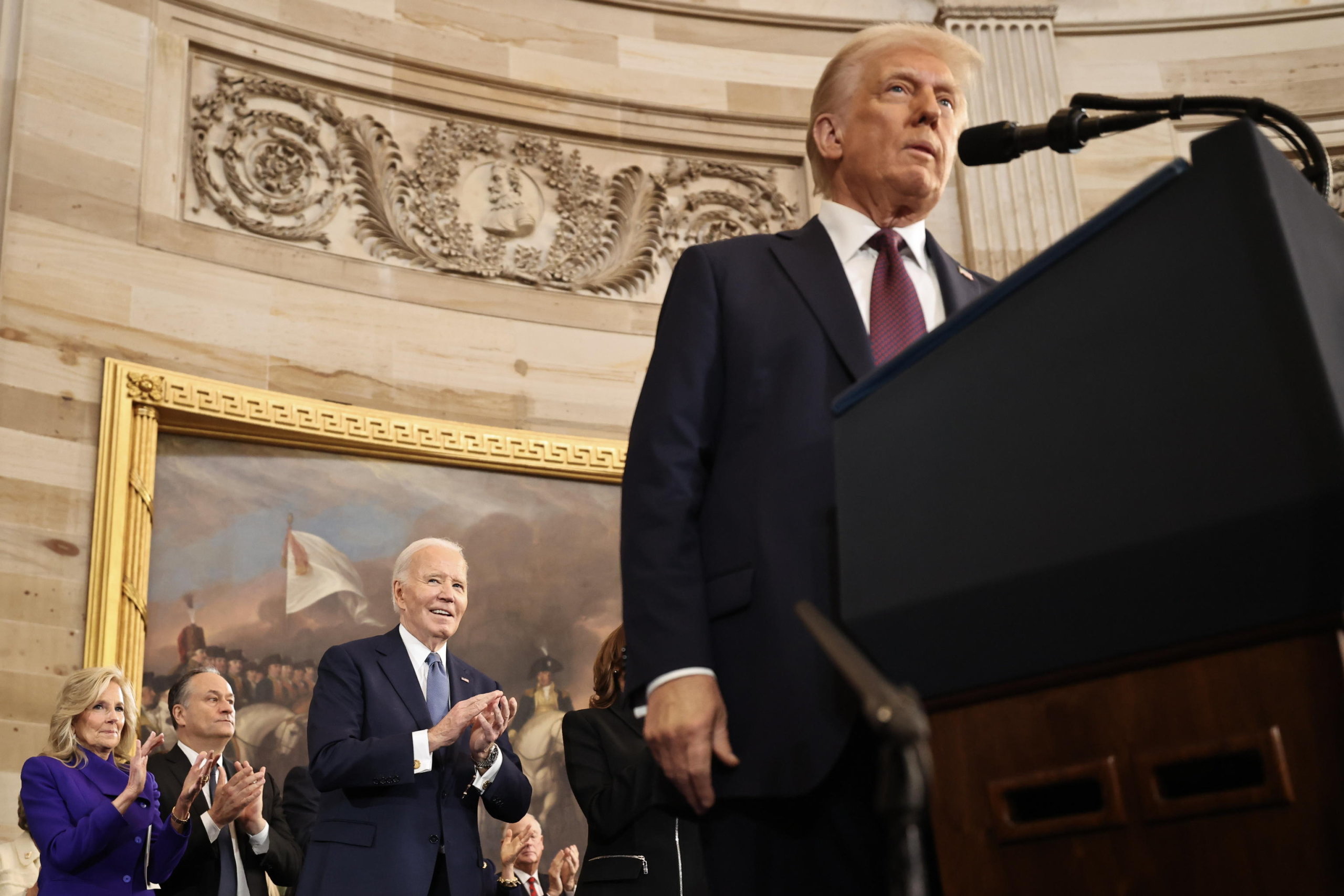 epa11839431 (L-R) Former first lady Jill Biden, former second gentleman Doug Emhoff and former U.S. President Joe Biden react as U.S. President Donald Trump speaks during inauguration ceremonies in the Rotunda of the U.S. Capitol on January 20, 2025 in Washington, DC. Donald Trump takes office for his second term as the 47th president of the United States.  EPA/Chip Somodevilla / POOL