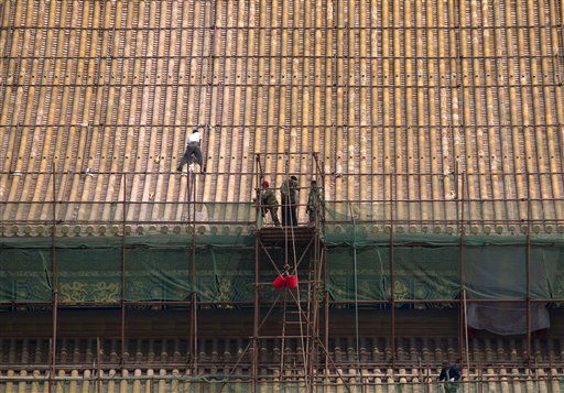 Operai al lavoro a Beijing