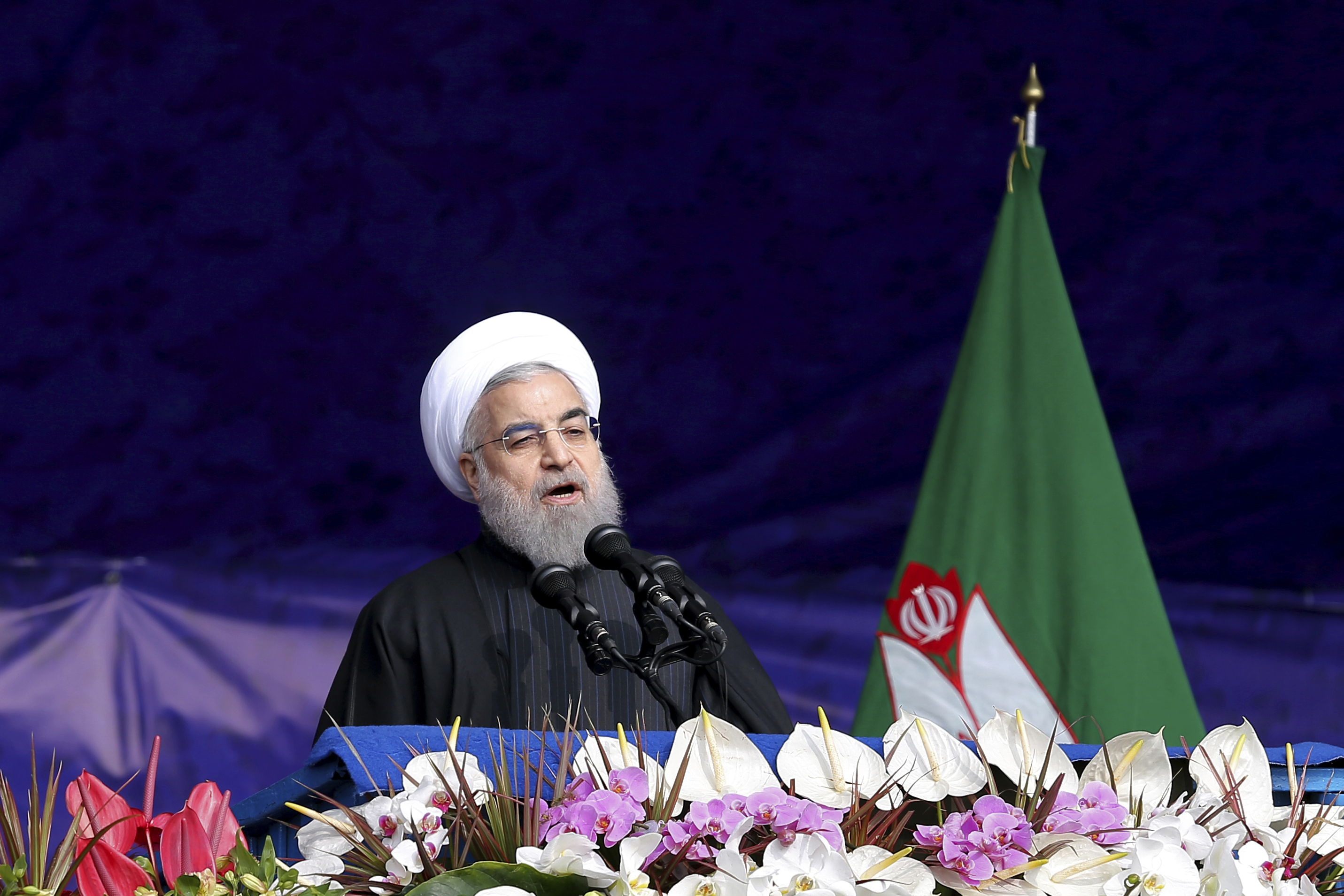 Iranian President Hassan Rouhani, delivers a speech during an annual rally commemorating the anniversary of the 1979 Islamic revolution, which toppled the late pro-U.S. Shah, Mohammad Reza Pahlavi, in Tehran, Iran, Friday, Feb. 10, 2017. (AP Photo/Ebrahim Noroozi)