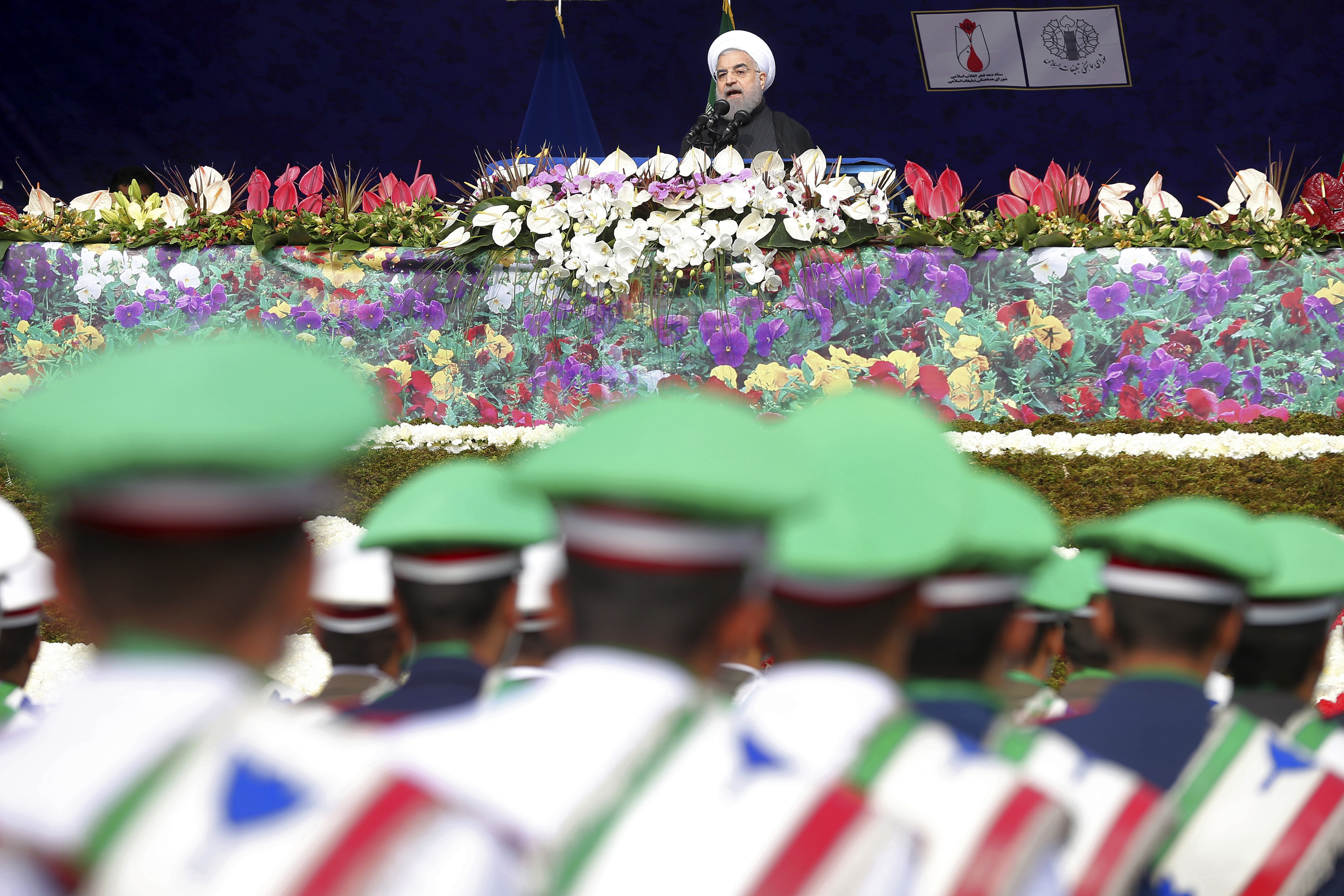 Iranian President Hassan Rouhani delivers a speech during an annual rally commemorating the anniversary of the 1979 Islamic revolution, which toppled the late pro-U.S. Shah, Mohammad Reza Pahlavi, in Tehran, Iran, Friday, Feb. 10, 2017. (AP Photo/Ebrahim Noroozi)