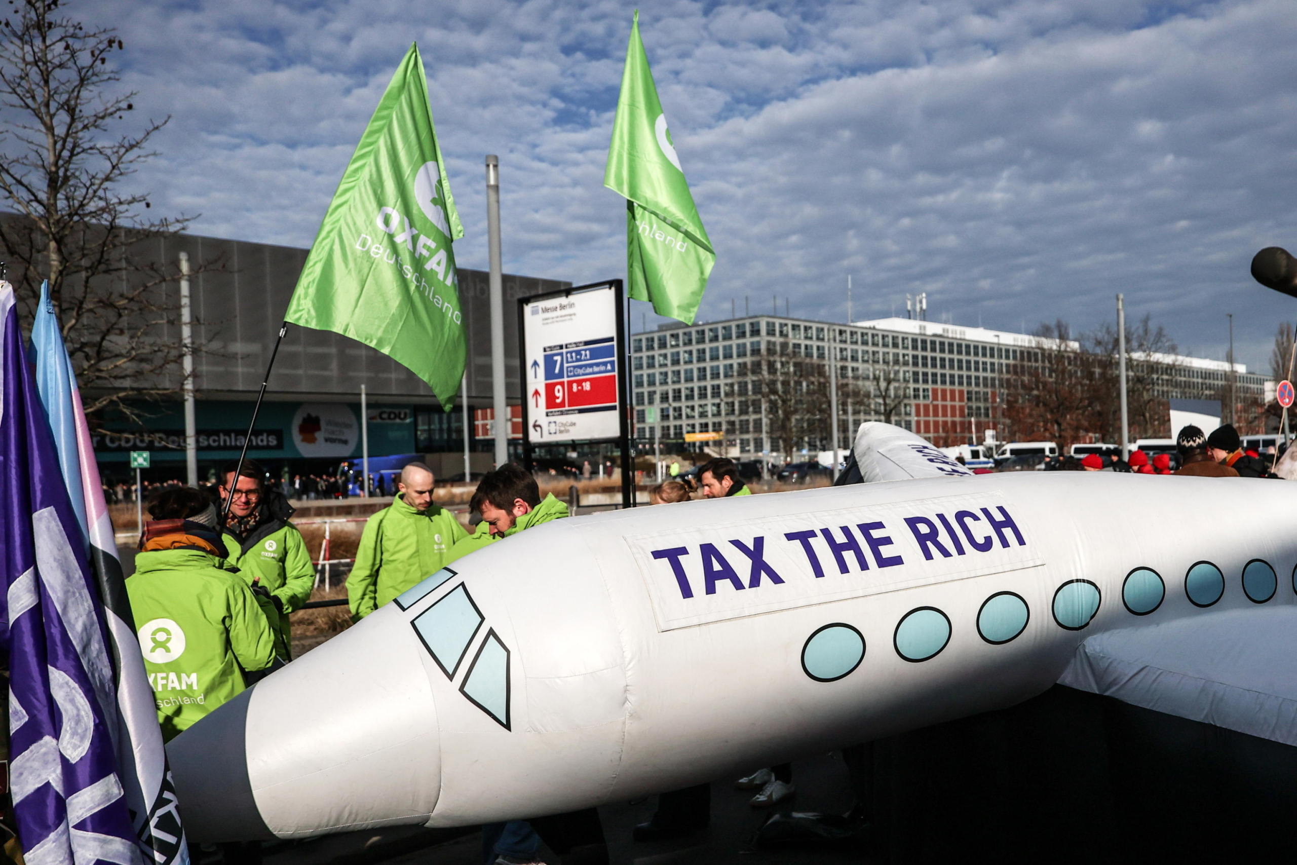 epa11872428 An inflatable private jet is seen during a protest against cooperation with the Alternative for Germany 'AfD' party ahead of the Christian Democratic Union 'CDU' federal party conference in Berlin, Germany, 03 February 2025. People gathered to protest against the CDU's cooperation with the AfD party after the CDU's motion in the Bundestag won a majority with the help of AfD votes.  EPA/Filip Singer