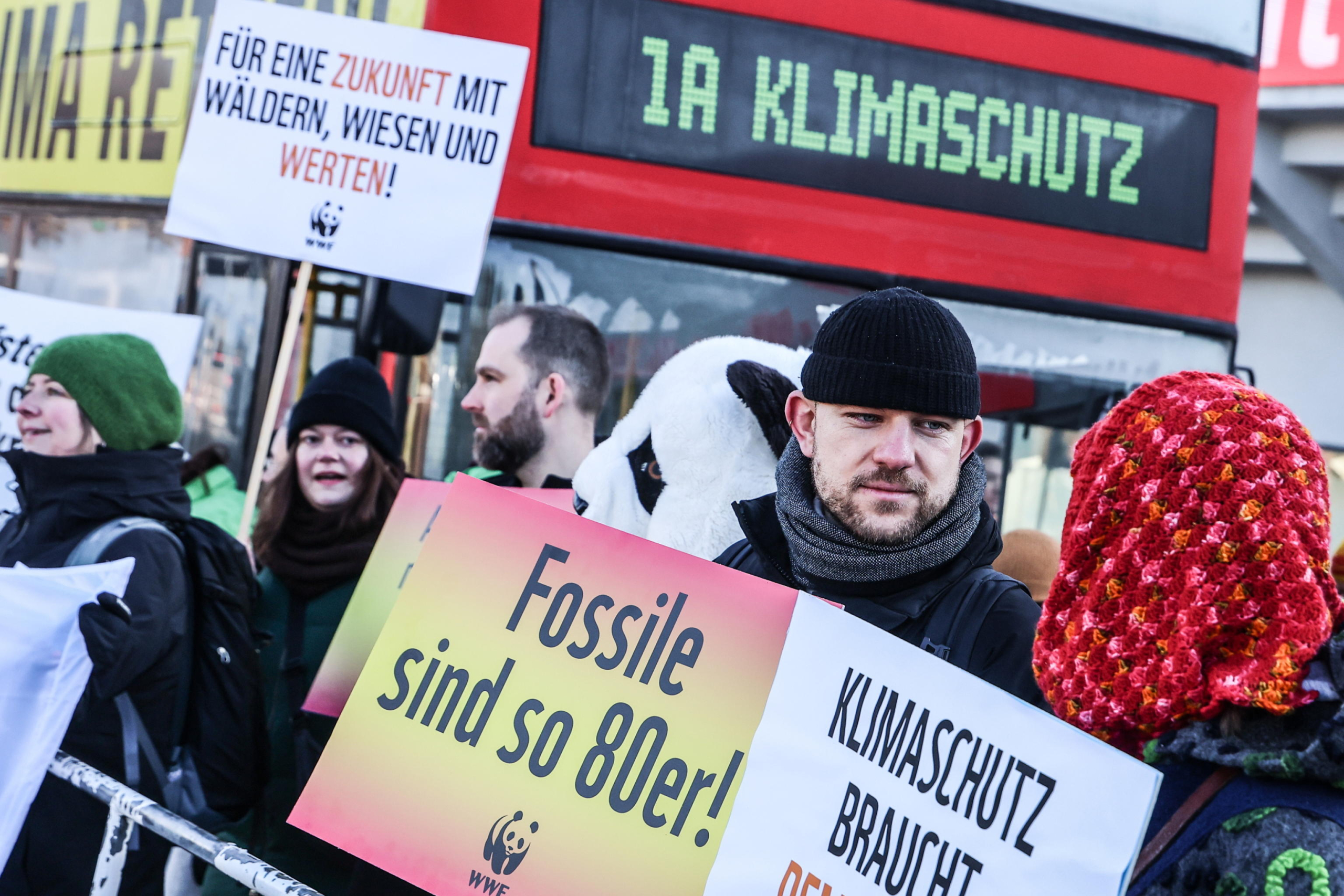 epa11872465 Climate protesters attend a protest against cooperation with the Alternative for Germany 'AfD' party ahead of the Christian Democratic Union 'CDU' federal party conference in Berlin, Germany, 03 February 2025. People gathered to protest against the CDU's cooperation with the AfD party after the CDU's motion in the Bundestag won a majority with the help of AfD votes.  EPA/Filip Singer