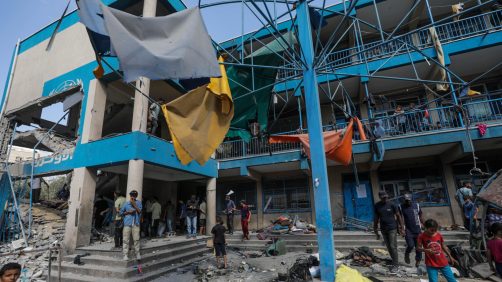 epa11478042 Palestinians inspect a damaged UNRWA school following an Israeli air strike in Al Nuseirat refugee camp, central Gaza Strip, 14 July 2024. At least 12 people were killed following an Israeli air strike in the camp, according to the Palestinian Ministry of Health. More than 38,000 Palestinians and over 1,400 Israelis have been killed, according to the Palestinian Health Ministry and the Israel Defense Forces (IDF), since Hamas militants launched an attack against Israel from the Gaza Strip on 07 October 2023, and the Israeli operations in Gaza and the West Bank which followed it.  EPA/MOHAMMED SABER