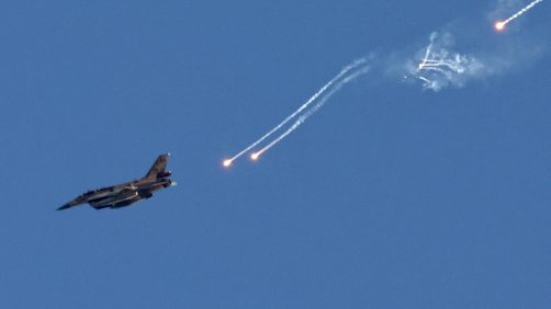 epa11563781 An Israeli fighter jet ejects flares over an area near the Lebanon-Israel border, as seen from northern Israel, 25 August 2024. The Israeli military stated that Israeli Air Force fighter jets are currently striking targets belonging to the Hezbollah organization that posed an imminent threat to the citizens of the State of Israel.  EPA/ATEF SAFADI