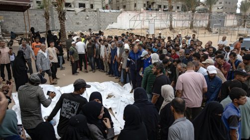 epa11659965 Palestinians, including victims' relatives, gather next to the bodies of members of the Abu Taima family, killed in an Israeli air strike, at the Khan Younis refugee camp, southern Gaza Strip, 15 October 2024. According to Nasser Hospital, at least 10 members of an extended family were killed in an Israeli airstrike on their home in Bani Suhaila, east of Khan Younis early on 15 October. More than 42,200 Palestinians and over 1,400 Israelis have been killed, according to the Palestinian Health Ministry and the Israeli Army, Tsahal, since Hamas militants launched an attack against Israel from the Gaza Strip on 07 October 2023, and the Israeli operations in Gaza and the West Bank which followed it.  EPA/HAITHAM IMAD