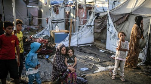 epa11657926 Palestinians inspect destroyed makeshift tents at a camp for internally displaced people on the premises of al-Aqsa Hospital, after the area was hit by an Israeli air strike, in Deir al Balah, central Gaza Strip, 14 October 2024. According to the Palestinian Ministry of Health, four people were killed as a result of the strike on al-Asqa hospital, and several dozens were wounded. More than 42,200 Palestinians and over 1,400 Israelis have been killed, according to the Palestinian Health Ministry and the Israel Defense Forces (IDF), since Hamas militants launched an attack against Israel from the Gaza Strip on 07 October 2023, and the Israeli operations in Gaza and the West Bank which followed it.  EPA/MOHAMMED SABER