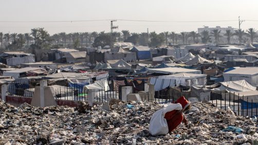 epa11700504 A Palestinian child sorts through garbage while collecting plastic from a landfill, amid a shortage of cooking gas and fuel, at the Khan Younis refugee camp, in the southern Gaza Strip, 04 November 2024. A United Nations Office for the Coordination of Humanitarian Affairs (OCHA) assessment carried out across some IDP camps in Gaza in May 2024 pointed to 'makeshift dwellings being made of blankets, nylon, and foraged materials. With no electricity, and cooking gas and wood being too expensive, families were resorting to burning trash and plastic to cook. According to the UN, at least 1.9 million people across the Gaza Strip are internally displaced. Since October 2023, only about 11 percent of the Gaza Strip has not been placed under Israeli-issued evacuation orders, the UN aid coordination office OCHA said.  EPA/HAITHAM IMAD