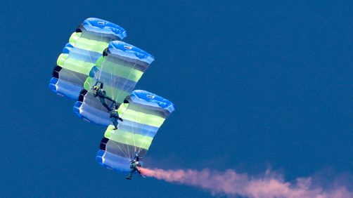 epa11786578 Taiwanese paratroopers perform a formation during a live training session in Pingtung city, Taiwan, 20 December 2024. According to a 18 December report published by the United States Department of Defense (DoD), in 2023, China continued to increase diplomatic, political, and military pressure against Taiwan.  EPA/RITCHIE B. TONGO