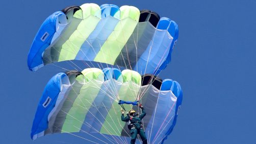 epa11786579 Taiwanese paratroopers perform a formation during a live training session in Pingtung city, Taiwan, 20 December 2024. According to a 18 December report published by the United States Department of Defense (DoD), in 2023, China continued to increase diplomatic, political, and military pressure against Taiwan.  EPA/RITCHIE B. TONGO