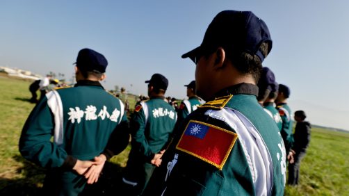 epa11786586 Taiwanese paratroopers line up during a live training session in Pingtung city, Taiwan, 20 December 2024. According to a 18 December report published by the United States Department of Defense (DoD), China continued to increase diplomatic, political, and military pressure against Taiwan in 2023.  EPA/RITCHIE B. TONGO