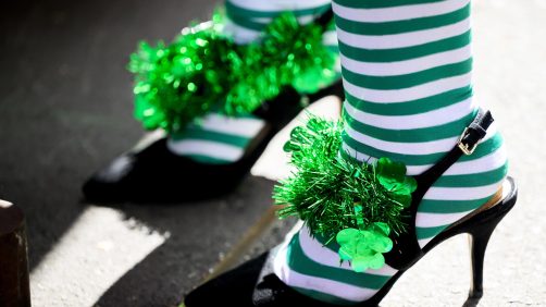 epa11969386 A person wears Irish themed attire during Saint Patrick's Day celebrations at The Merc street party in Sydney, Australia, 17 March 2025. Saint Patrick's Day, or the Feast of Saint Patrick, is a religious and cultural holiday held annually on 17 March, the traditional death date of Saint Patrick a patron saint of Ireland.  EPA/BIANCA DE MARCHI  AUSTRALIA AND NEW ZEALAND OUT