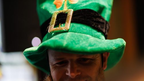 epa11969397 A reveller celebrates on Saint Patrick's Day at the Irish Times pub, in Melbourne, Australia, 17 March 2025. Saint Patrick's Day, or the Feast of Saint Patrick, is a religious and cultural holiday held annually on 17 March, the traditional death date of Saint Patrick a patron saint of Ireland.  EPA/NADIR KINANI  AUSTRALIA AND NEW ZEALAND OUT